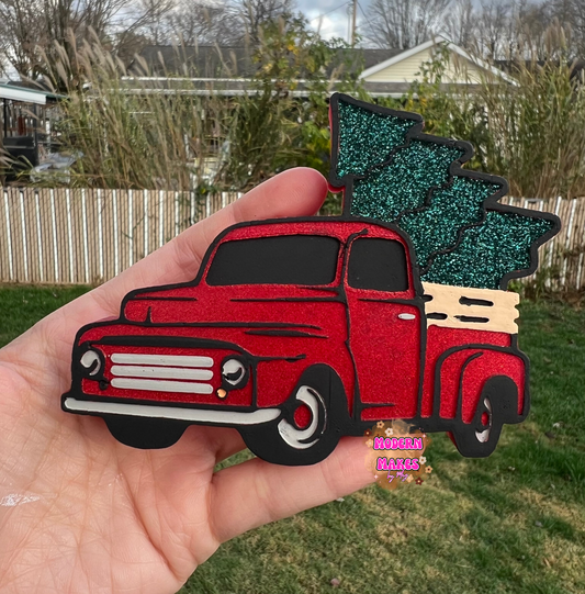 Little Truck Hauling a Christmas Tree